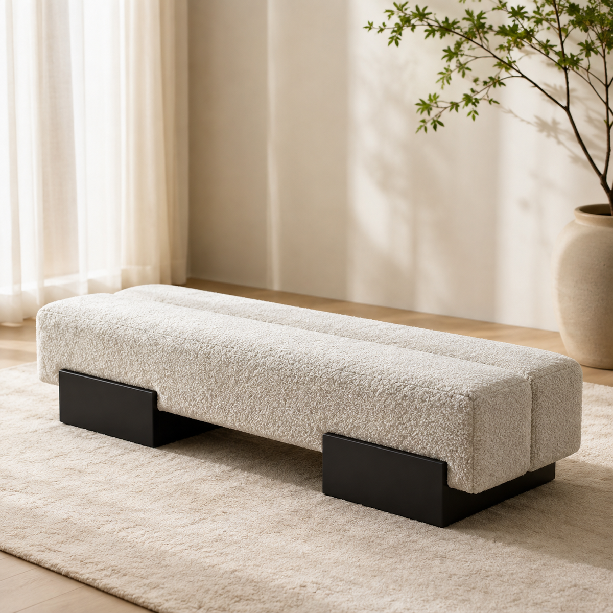 Brea Bench on a wool rug beside a sheer curtain and a ceramic vase
